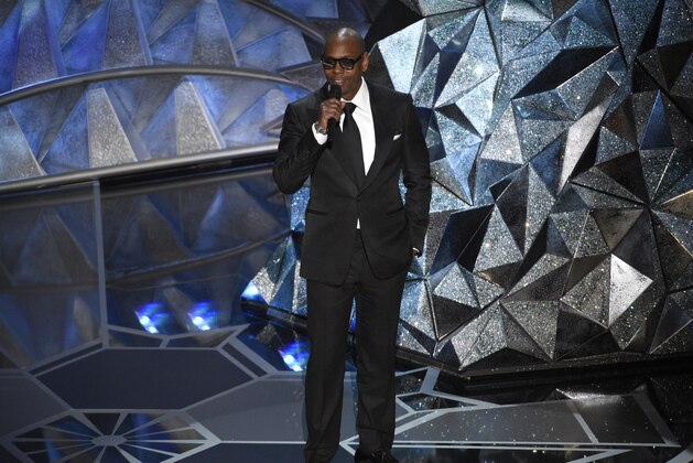 Dave Chappelle introduces a performance by Andra Day and Common at the Oscars on Sunday, March 4, 2018, at the Dolby Theatre in Los Angeles. (Photo by Chris Pizzello/Invision/AP)