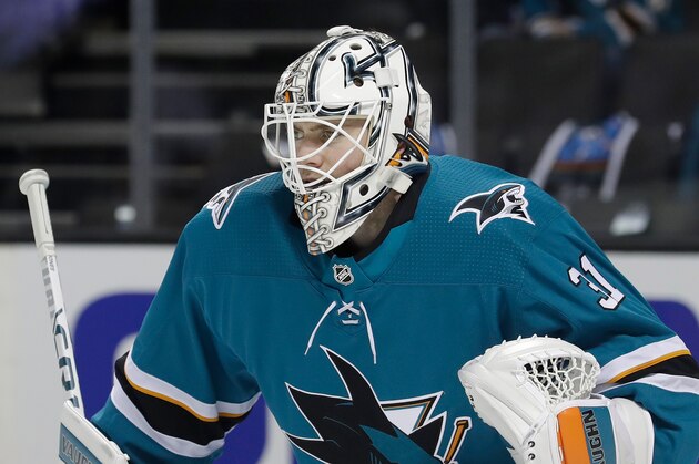 This April 16, 2018 photo shows San Jose Sharks goalie Martin Jones (31) during action against the Anaheim Ducks in the second period of Game 3 of an NHL hockey first-round playoff series in San Jose, Calif. Jones has been the missing ingredient for the Sharks ever since arriving in San Jose three years ago. With Jones in net, the Sharks have gone from a team known for playoff disappointments into one that has had more success this time of year. He led San Jose to the Stanley Cup Final two years ago and was even better during a first-round sweep this year against Anaheim. (AP Photo/Jeff Chiu)