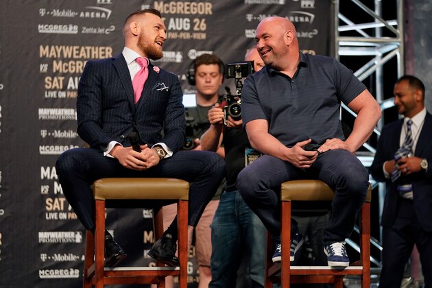 LOS ANGELES, CA - JULY 11:  (L-R) Conor McGregor and UFC President Dana White interact on stage during the Floyd Mayweather Jr. v Conor McGregor World Press Tour event at the Staples Center on July 11, 2017 in Los Angeles, California. (Photo by Jeff Bottari/Zuffa LLC/Zuffa LLC via Getty Images)