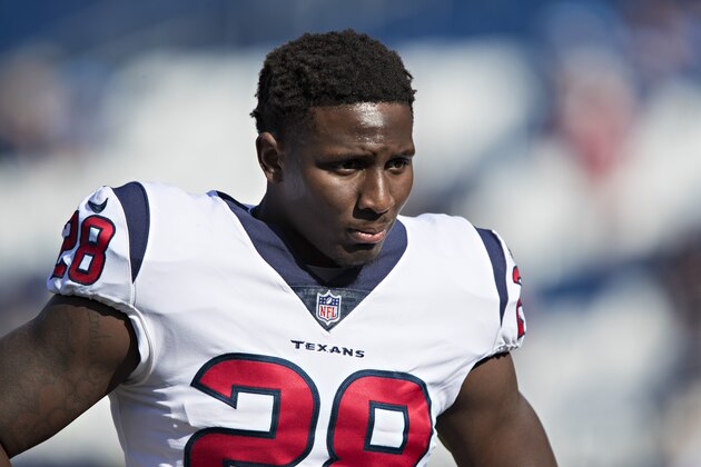 NASHVILLE, TN - DECEMBER 3:  Alfred Blue #28 of the Houston Texans warming up before a game against the Tennessee Titans at Nissan Stadium on December 3, 2017 in Nashville, Tennessee.  The Titans defeated the Texans 23-14.  (Photo by Wesley Hitt/Getty Images)
