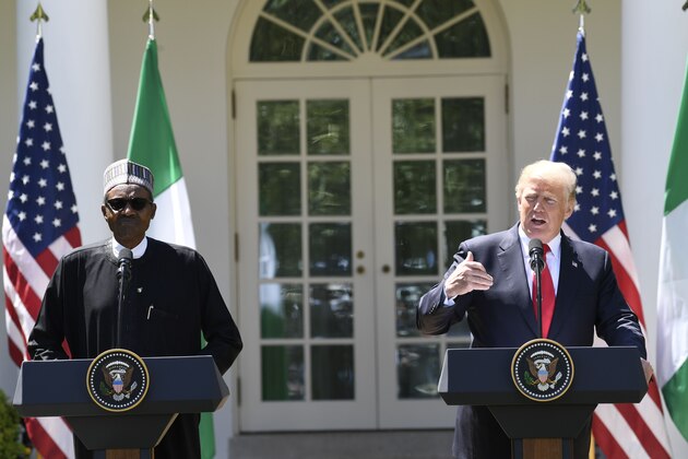 US President Donald Trump and Nigerian President Muhammadu Buhari hold a joint press conference in the Rose Garden of the White House on April 30, 2018, in Washington, DC. (Photo by SAUL LOEB / AFP)        (Photo credit should read SAUL LOEB/AFP/Getty Images)