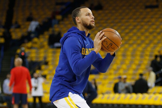 OAKLAND, CA - APRIL 28: Stephen Curry #30 of the Golden State Warriors shoots during the warm up before Game One of the Western Conference Semifinals against the New Orleans Pelicans at ORACLE Arena on April 28, 2018 in Oakland, California. NOTE TO USER: User expressly acknowledges and agrees that, by downloading and or using this photograph, User is consenting to the terms and conditions of the Getty Images License Agreement. (Photo by Lachlan Cunningham/Getty Images)