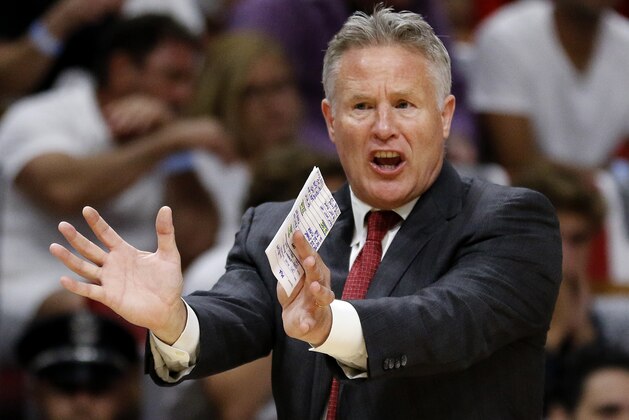 Philadelphia 76ers head coach Brett Brown directs his team in the first quarter of play against the Miami Heat in Game 4 of a first-round NBA basketball playoff series, Saturday, April 21, 2018, in Miami. (AP Photo/Joe Skipper)
