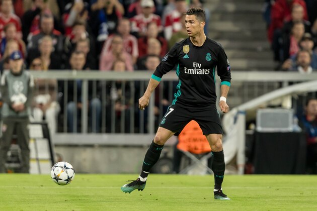 MUNICH, GERMANY - APRIL 25: Cristiano Ronaldo of Real Madrid controls the ball during the UEFA Champions League Semi Final First Leg match between Bayern Muenchen and Real Madrid at the Allianz Arena on April 25, 2018 in Munich, Germany. (Photo by TF-Images/Getty Images)