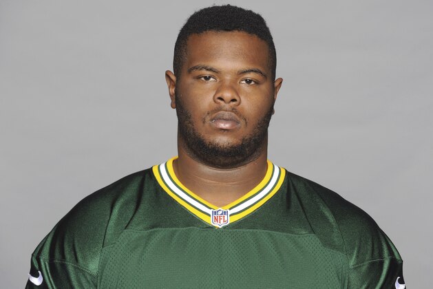 FILE - This is a 2014 file photo showing former Green Bay Packers NFL football player Carlos Gray. Authorities say a former Green Bay Packers player has been found shot to death in his home in Alabama. The Jefferson County Coroner's Office says former Packers defensive lineman Carlos Gray was found shortly before 10 p.m. Monday, April 30, 2018, near Birmingham, Alabama. The 25-year-old is a native of Pinson, Alabama. (AP Photo/File)