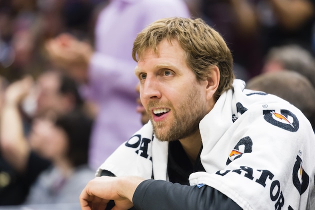 CLEVELAND, OH - APRIL 1: Dirk Nowitzki #41 of the Dallas Mavericks watches from the bench during the second half against the Cleveland Cavaliers at Quicken Loans Arena on April 1, 2018 in Cleveland, Ohio. The Cavaliers defeated the Mavericks 98-87. NOTE TO USER: User expressly acknowledges and agrees that, by downloading and or using this photograph, User is consenting to the terms and conditions of the Getty Images License Agreement. (Photo by Jason Miller/Getty Images) *** Local Caption *** Dirk Nowitzki