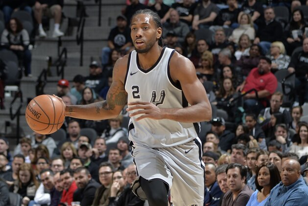 SAN ANTONIO, TX - JANUARY 13:  Kawhi Leonard #2 of the San Antonio Spurs handles the ball against the Denver Nuggets on January 13, 2018 at the AT&T Center in San Antonio, Texas. NOTE TO USER: User expressly acknowledges and agrees that, by downloading and or using this photograph, user is consenting to the terms and conditions of the Getty Images License Agreement. Mandatory Copyright Notice: Copyright 2018 NBAE (Photos by Mark Sobhani/NBAE via Getty Images)
