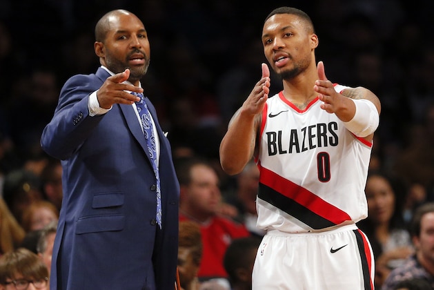 NEW YORK, NY - NOVEMBER 24:  Assistant Coach David Vanterpool of the Portland Trail Blazers talks with Damian Lillard #0 of the Trail Blazers during a break in the action in an NBA basketball game against the Brooklyn Nets on November 24,2017 at Barclays Center in the Brooklyn borough of New York City. Portland won 127-125. NOTE TO USER: User expressly acknowledges and agrees that, by downloading and/or using this Photograph, user is consenting to the terms and conditions of the Getty License agreement. Mandatory Copyright Notice (Photo by Paul Bereswill/Getty Images)