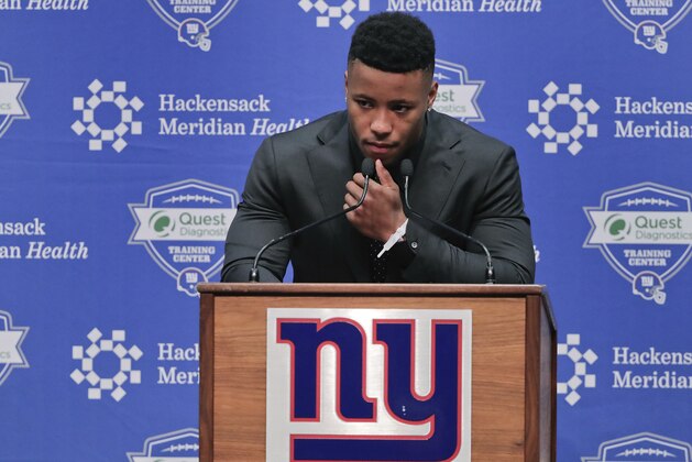 Running back Saquon Barkley answers questions during a news conference, Saturday, April 28, 2018, in East Rutherford, N.J. Barkley was selected as the number two overall pick in the NFL football draft by the New York Giants. (AP Photo/Julie Jacobson)