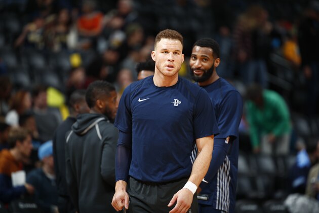 Detroit Pistons forward Blake Griffin (23) and Detroit Pistons center Andre Drummond (0) in the first half of an NBA basketball game Thursday, March 15, 2018, in Denver. (AP Photo/David Zalubowski)