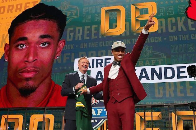 ARLINGTON, TX - APRIL 26:  Jaire Alexander of Louisville reacts with NFL Commissioner Roger Goodell after being picked #18 overall by the Green Bay Packers during the first round of the 2018 NFL Draft at AT&T Stadium on April 26, 2018 in Arlington, Texas.  (Photo by Tom Pennington/Getty Images)