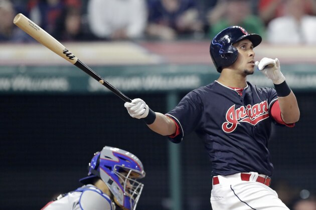 Cleveland Indians' Michael Brantley watches his ball after hitting a grand slam off Texas Rangers relief pitcher Keone Kela in the ninth inning of a baseball game, Tuesday, May 1, 2018, in Cleveland. Bradley Zimmer, Francisco Lindor, and Jason Kipnis scored on the play. (AP Photo/Tony Dejak)