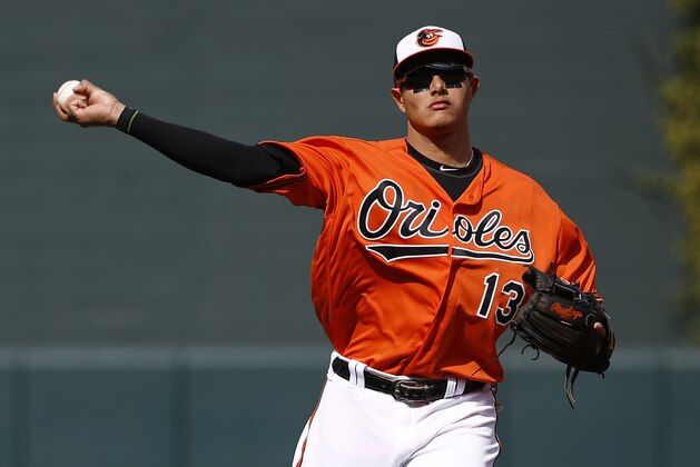 Baltimore Orioles shortstop Manny Machado warms up before a baseball game against the Cleveland Indians, Saturday, April 21, 2018, in Baltimore. (AP Photo/Patrick Semansky)