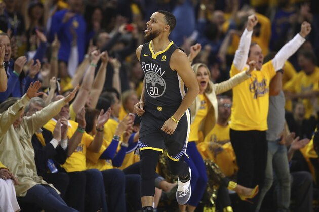 Golden State Warriors' Stephen Curry (30) celebrates a score against the New Orleans Pelicans in the first half in Game 2 of a second-round NBA basketball playoff series Tuesday, May 1, 2018, in Oakland, Calif. (AP Photo/Ben Margot)
