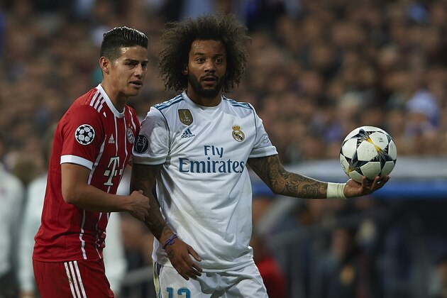 MADRID, SPAIN - MAY 01:  Marcelo of Real Madrid and James Rodriguez of Bayern Muenchen during the UEFA Champions League Semi Final Second Leg match between Real Madrid and Bayern Muenchen at the Bernabeu on May 1, 2018 in Madrid, Spain. (Photo by Quality Sport Images/Getty Images)