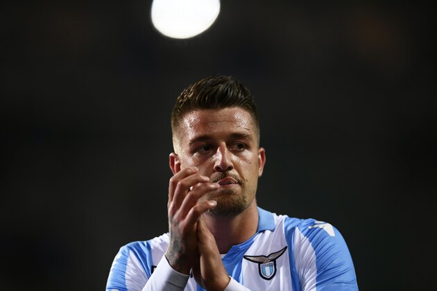 Lazio's midfielder Sergej Milinkovic-Savic from Serbia celebrates at the end of the Italian Serie A football match Torino Vs Lazio on April 29, 2018 at the 'Grande Torino Stadium' in Turin. (Photo by MARCO BERTORELLO / AFP)        (Photo credit should read MARCO BERTORELLO/AFP/Getty Images)