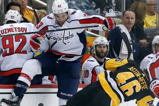 PITTSBURGH, PA - MAY 01:  Tom Wilson #43 of the Washington Capitals collides with Zach Aston-Reese #46 of the Pittsburgh Penguins during the second period in Game Three of the Eastern Conference Second Round during the 2018 NHL Stanley Cup Playoffs at PPG PAINTS Arena on May 1, 2018 in Pittsburgh, Pennsylvania. (Photo by Kirk Irwin/Getty Images)