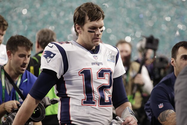 New England Patriots quarterback Tom Brady (12) walks off the field after the NFL Super Bowl 52 football game against the Philadelphia Eagles, Sunday, Feb. 4, 2018, in Minneapolis. The Eagles won 41-33. (AP Photo/Chris O'Meara)