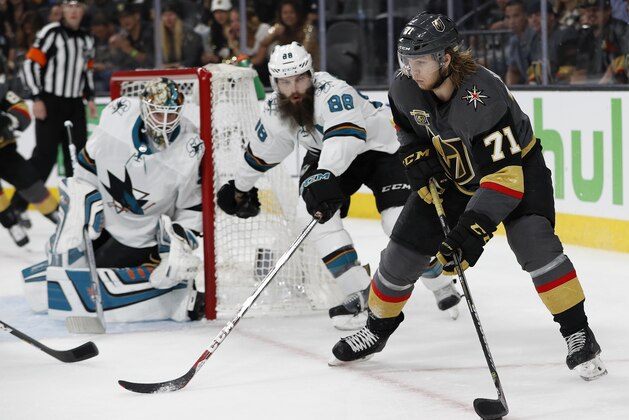 Vegas Golden Knights center William Karlsson (71) skates around San Jose Sharks defenseman Brent Burns (88) during the second period of Game 1 of an NHL hockey second-round playoff series, Thursday, April 26, 2018, in Las Vegas. (AP Photo/John Locher)