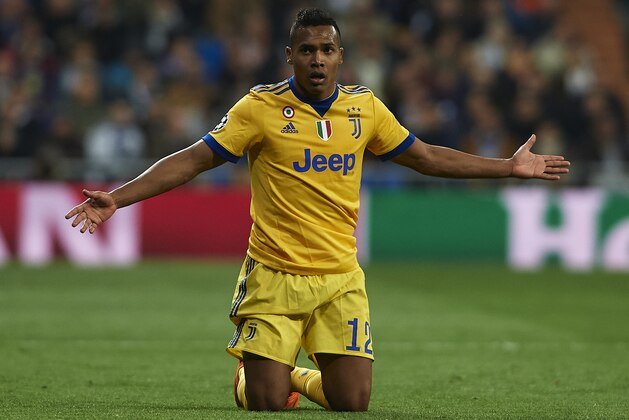 MADRID, SPAIN - APRIL 11:  Alex Sandro of Juventus reacts on the pitch during the UEFA Champions League Quarter Final Second Leg match between Real Madrid and Juventus at Estadio Santiago Bernabeu on April 11, 2018 in Madrid, Spain.  (Photo by Quality Sport Images/Getty Images)