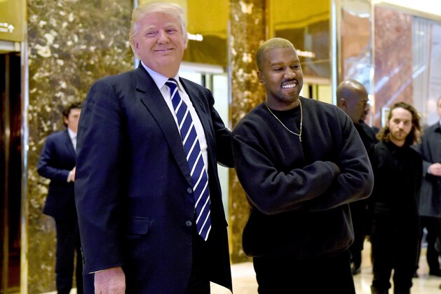 Singer Kanye West and President-elect Donald Trump speak with the press after their meetings at Trump Tower December 13, 2016 in New York. / AFP PHOTO / TIMOTHY A. CLARY        (Photo credit should read TIMOTHY A. CLARY/AFP/Getty Images)