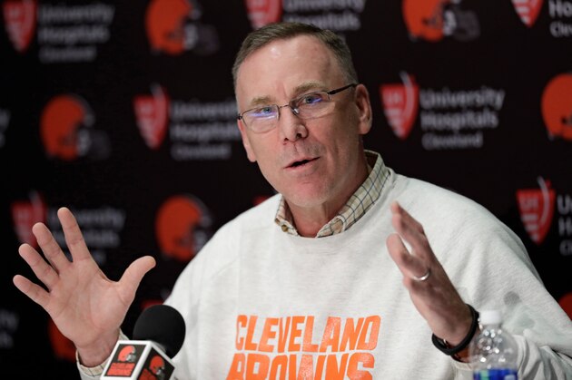 FILE - In this April 19, 2018, file photo, Cleveland Browns general manager John Dorsey answers questions about the draft during a news conference at the NFL football team's training camp facility, in Berea, Ohio. With the NFL draft quickly approaching, the team’s die-hard supporters, and there have been few groups in NFL history to suffer like this one has the past two seasons, are divided over which of the top four college QBs the team should select.  (AP Photo/Tony Dejak, File)