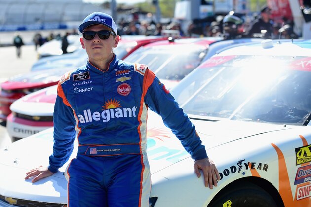 RICHMOND, VA - APRIL 20:  Spencer Gallagher, driver of the #23 Allegiant Chevrolet, stands on the grid during qualifying for the NASCAR Xfinity Series ToyotaCare 250 at Richmond Raceway on April 20, 2018 in Richmond, Virginia.  (Photo by Jared C. Tilton/Getty Images)
