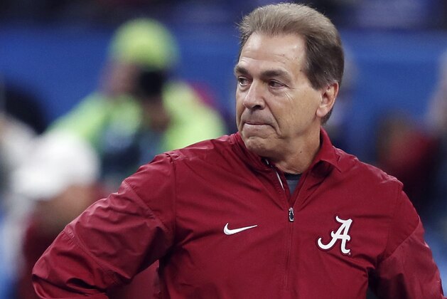 FILE - In this Jan. 1, 2018, file photo, Alabama head coach Nick Sabanlooks on before the Sugar Bowl semifinal playoff game for the NCAA college football national championship, in New Orleans. Nick Saban vs. Kirby Smart is only the latest in a line of high-stakes coaching matchups between mentors and mentees over the history of college football. (AP Photo/Gerald Herbert, File)