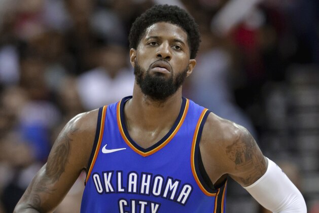 Oklahoma City Thunder forward Paul George (13) during the second half of an NBA basketball game against the Houston Rockets Saturday, April 7, 2018, in Houston. (AP Photo/Michael Wyke) Oklahoma City Thunder forward Paul George (13) during the second half of an NBA basketball game against the Houston Rockets Saturday, April 7, 2018, in Houston. (AP Photo/Michael Wyke)