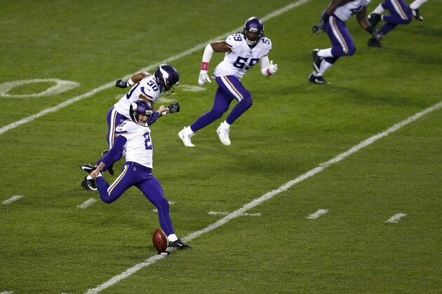 Minnesota Vikings' Kai Forbath (2) boots the opening kickoff to the Chicago Bears to start an NFL football game, Monday, Oct. 9, 2017, in Chicago. (AP Photo/Kiichiro Sato)