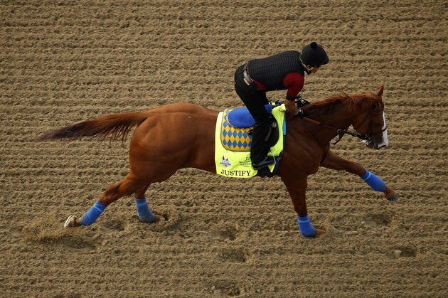 Kentucky Derby entrant Justify runs during a morning workout at Churchill Downs Wednesday, May 2, 2018, in Louisville, Ky. The 144th running of the Kentucky Derby is scheduled for Saturday, May 5. (AP Photo/Charlie Riedel)