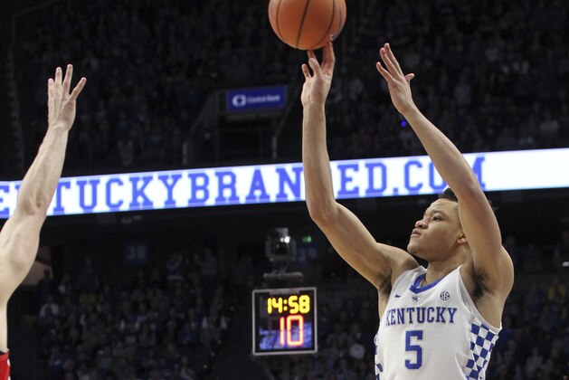 Kentucky's Kevin Knox (5) shoots against Mississippi during the first half of an NCAA college basketball game Wednesday, Feb. 28, 2018, in Lexington, Ky. (AP Photo/James Crisp)