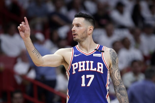Philadelphia 76ers' JJ Redick (17) gestures during the second half of Game 3 of a first-round NBA basketball playoff series against the Miami Heat, Thursday, April 19, 2018, in Miami. The 76ers won 128-108. (AP Photo/Lynne Sladky)
