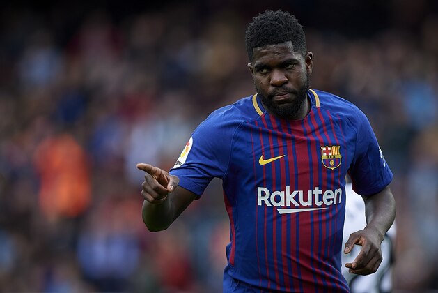 BARCELONA, SPAIN - APRIL 14:  Samuel Umtiti of Barcelona celebrates after scoring the second goal during the La Liga match between Barcelona and Valencia at Camp Nou on April 14, 2018 in Barcelona, Spain.  (Photo by Quality Sport Images/Getty Images)