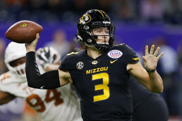 HOUSTON, TX - DECEMBER 27:  Drew Lock #3 of the Missouri Tigers looks for a receiver against the Texas Longhorns during the Academy Sports & Outdoors Bowl at NRG Stadium on December 27, 2017 in Houston, Texas.  (Photo by Bob Levey/Getty Images)