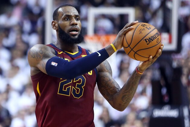 TORONTO, ON - MAY 01:  LeBron James #23 of the Cleveland Cavaliers catches a pass in the second half of Game One of the Eastern Conference Semifinals against the Toronto Raptors during the 2018 NBA Playoffs at Air Canada Centre on May 1, 2018 in Toronto, Canada.  NOTE TO USER: User expressly acknowledges and agrees that, by downloading and or using this photograph, User is consenting to the terms and conditions of the Getty Images License Agreement.  (Photo by Vaughn Ridley/Getty Images)
