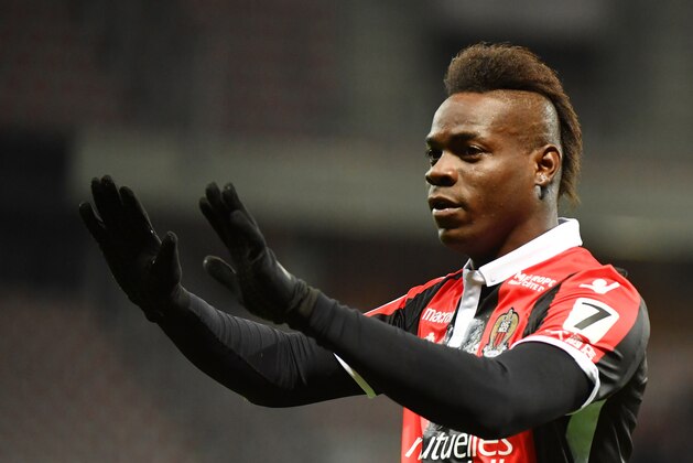 Nice's Italian forward Mario Balotelli celebrates after scoring a goal during the French L1 football match Nice (OGCN) vs Lille (LOSC) on March 2, 2018 at Allianz Riviera Stadium in Nice.  / AFP PHOTO / YANN COATSALIOU        (Photo credit should read YANN COATSALIOU/AFP/Getty Images)