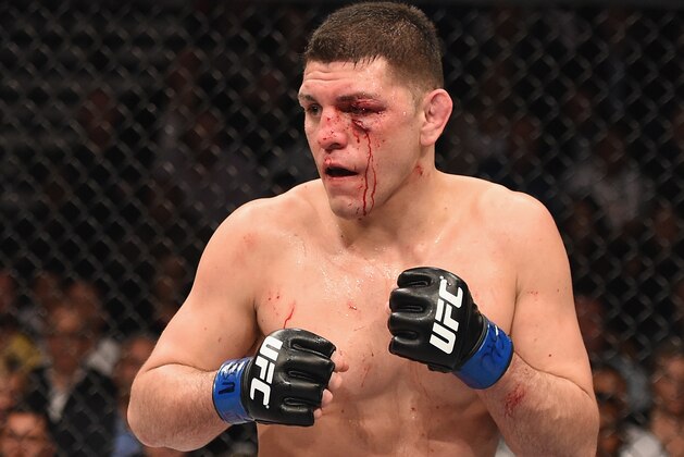 LAS VEGAS, NV - JANUARY 31:  Nick Diaz battles Anderson Silva (not pictured) in their middleweight bout during the UFC 183 event at the MGM Grand Garden Arena on January 31, 2015 in Las Vegas, Nevada.  (Photo by Josh Hedges/Zuffa LLC/Zuffa LLC via Getty Images)