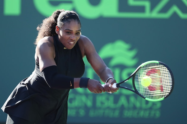 KEY BISCAYNE, FL - MARCH 21:  Serena Williams returns a shot against Naomi Osaka of Japan during Day 3 of the Miami Open at the Crandon Park Tennis Center on March 19, 2018 in Key Biscayne, Florida.  (Photo by Al Bello/Getty Images)