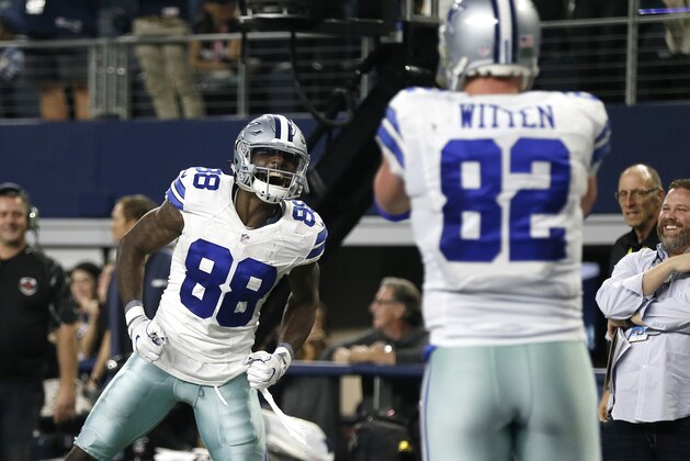 Dallas Cowboys' Dez Bryant (88) celebrates after throwing a pass for a touchdown to tight end Jason Witten (82) in the second half of an NFL football game against the Detroit Lions on Monday, Dec. 26, 2016, in Arlington, Texas. (AP Photo/Brandon Wade)