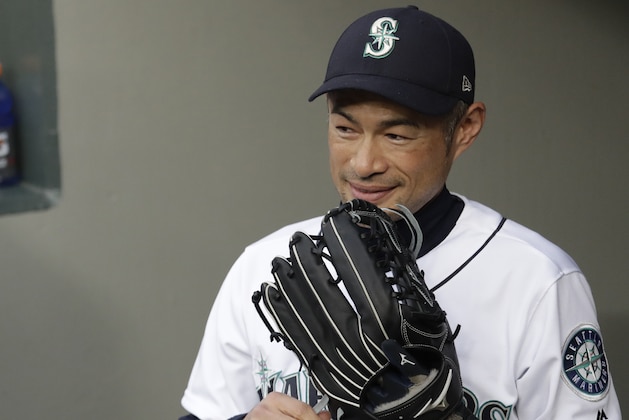 Seattle Mariners' Ichiro Suzuki stands in the dugout before a baseball game against the Oakland Athletics Wednesday, May 2, 2018, in Seattle. (AP Photo/Elaine Thompson)