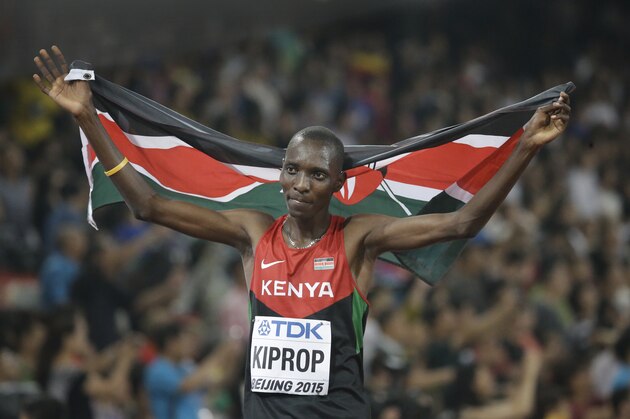 Kenya's Asbel Kiprop celebrates winning the gold medal in the men’s 1500m final at the World Athletics Championships at the Bird's Nest stadium in Beijing, Sunday, Aug. 30, 2015. (AP Photo/David J. Phillip)