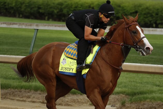 Kentucky Derby entrant Justify trains at Churchill Downs Thursday, May 3, 2018, in Louisville, Ky. The 144th running of the Kentucky Derby is scheduled for Saturday, May 5. (AP Photo/Charlie Riedel)