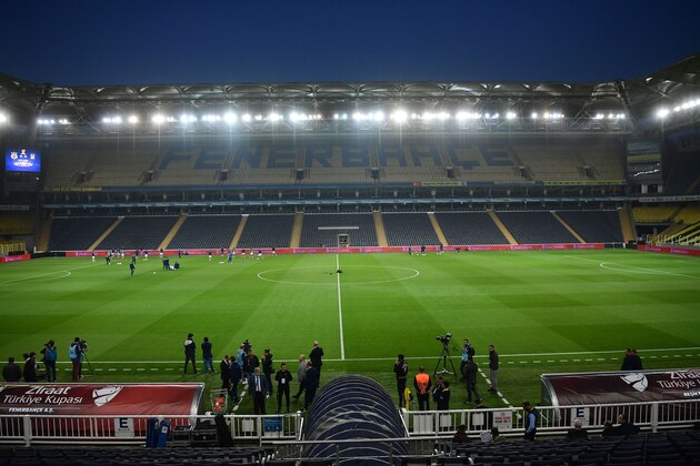 Fenerbahce's players warm up prior to the rescheduled Turkish Cup semi second leg final football match between Fenerbahce and Besiktas on May 3, 2018 at Sukru Saracoglu Stadium in Istanbul. - The match, a Turkish Cup semi-final second leg at Fenerbahce's ground on April 19, was abandoned in the 57th minute after Besiktas coach Senol Gunes was hit by an object hurled out of the stands. (Photo by OZAN KOSE / AFP)        (Photo credit should read OZAN KOSE/AFP/Getty Images)