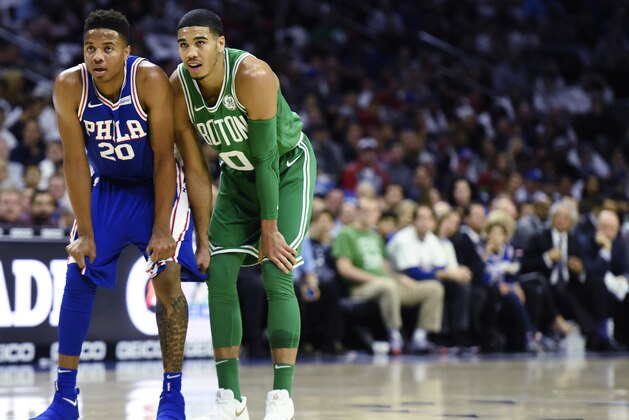 Philadelphia 76ers' Markelle Fultz, left, and Boston Celtics' Jayson Tatum are seen during an NBA basketball game, Friday, Oct. 20, 2017, in Philadelphia. (AP Photo/Michael Perez)