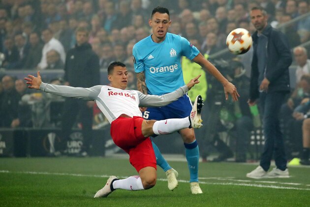 Salzburg's Stefan Lainer vies with Marseille's Lucas Ariel Ocampos during the UEFA Europa League semi-final second leg match between FC Salzburg and Olympique de Marseille (OM) on May 3, 2018 in Salzburg, Austria. (Photo by DANIEL KRUG / APA / AFP) / Austria OUT        (Photo credit should read DANIEL KRUG/AFP/Getty Images)