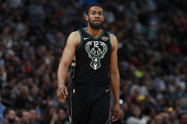 Milwaukee Bucks forward Jabari Parker (12) in the second half overtime of an NBA basketball game Sunday, April 1, 2018. The Nuggets won 128-125 in overtime. (AP Photo/David Zalubowski)