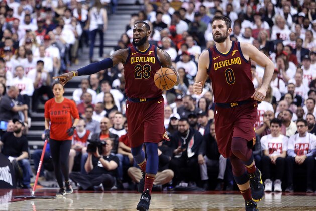 TORONTO, ON - MAY 01:  LeBron James #23 of the Cleveland Cavaliers dribbles the ball in the second half of Game One of the Eastern Conference Semifinals against the Toronto Raptors during the 2018 NBA Playoffs at Air Canada Centre on May 1, 2018 in Toronto, Canada.  NOTE TO USER: User expressly acknowledges and agrees that, by downloading and or using this photograph, User is consenting to the terms and conditions of the Getty Images License Agreement.  (Photo by Vaughn Ridley/Getty Images)