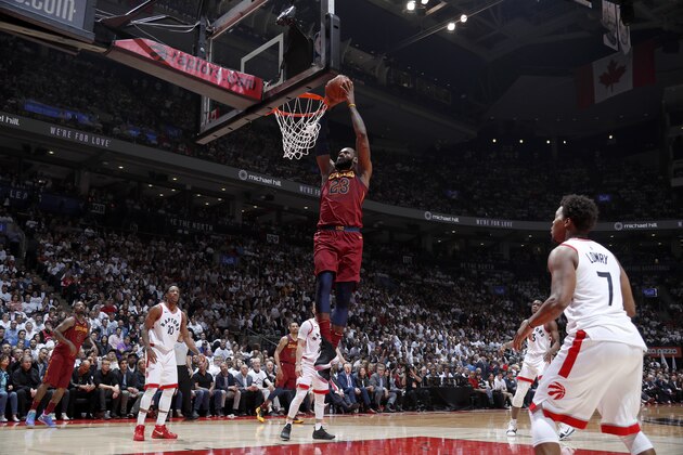 TORONTO, CANADA - MAY 3: LeBron James #23 of the Cleveland Cavaliers dunks the ball against the Toronto Raptors in Game Two of the Eastern Conference Semifinals during the 2018 NBA Playoffs on May 3, 2018 at the Air Canada Centre in Toronto, Ontario, Canada. NOTE TO USER: User expressly acknowledges and agrees that, by downloading and/or using this photograph, user is consenting to the terms and conditions of the Getty Images License Agreement. Mandatory Copyright Notice: Copyright 2018 NBAE (Photo by Mark Blinch/NBAE via Getty Images)