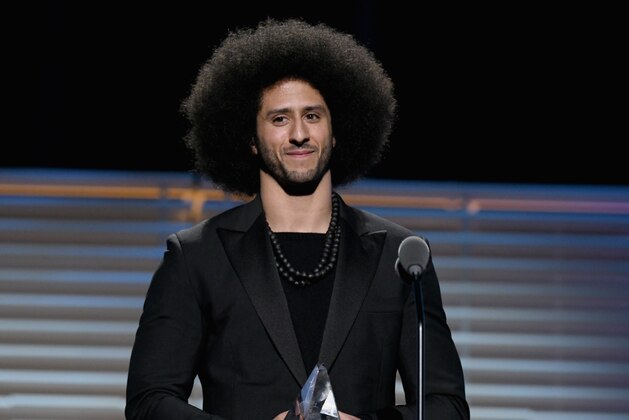 NEW YORK, NY - DECEMBER 05:  Colin Kaepernick receives the SI Muhammad Ali Legacy Award during SPORTS ILLUSTRATED 2017 Sportsperson of the Year Show on December 5, 2017 at Barclays Center in New York City.  Tune in to NBCSN on December 8 at 8 p.m. ET or Univision Deportes Network on December 9 at 8 p.m. ET to watch the one hour SPORTS ILLUSTRATED Sportsperson of the Year special.  (Photo by Slaven Vlasic/Getty Images for Sports Illustrated)